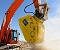 Дробильный ковш на экскаваторе